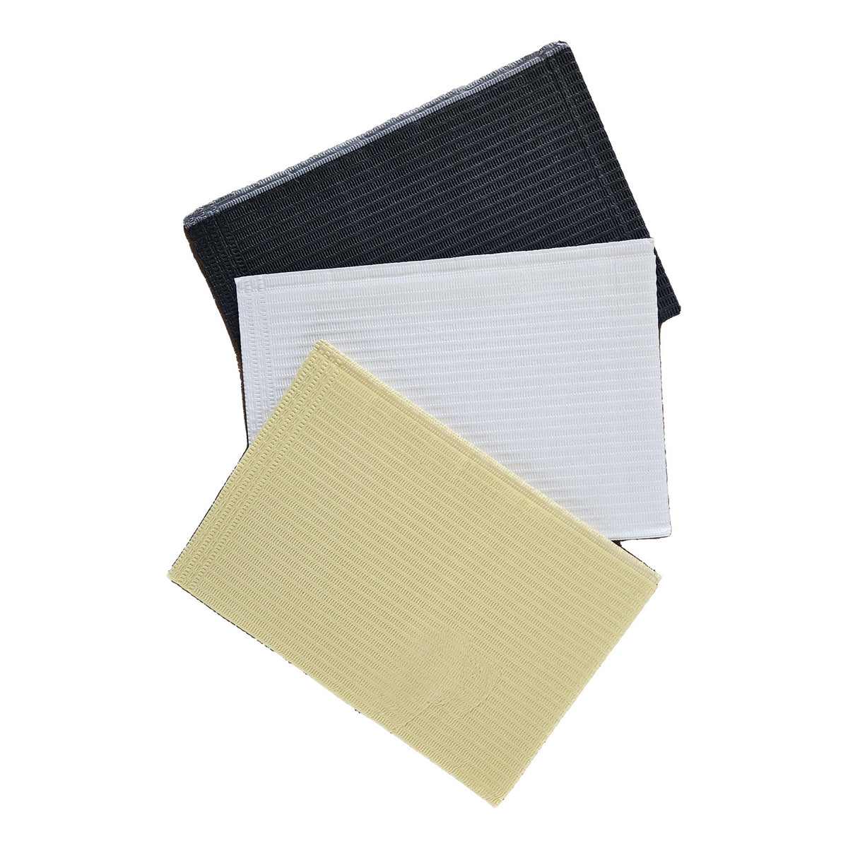 Aurelia dental bibs, yellow, white and black, stacked on white background