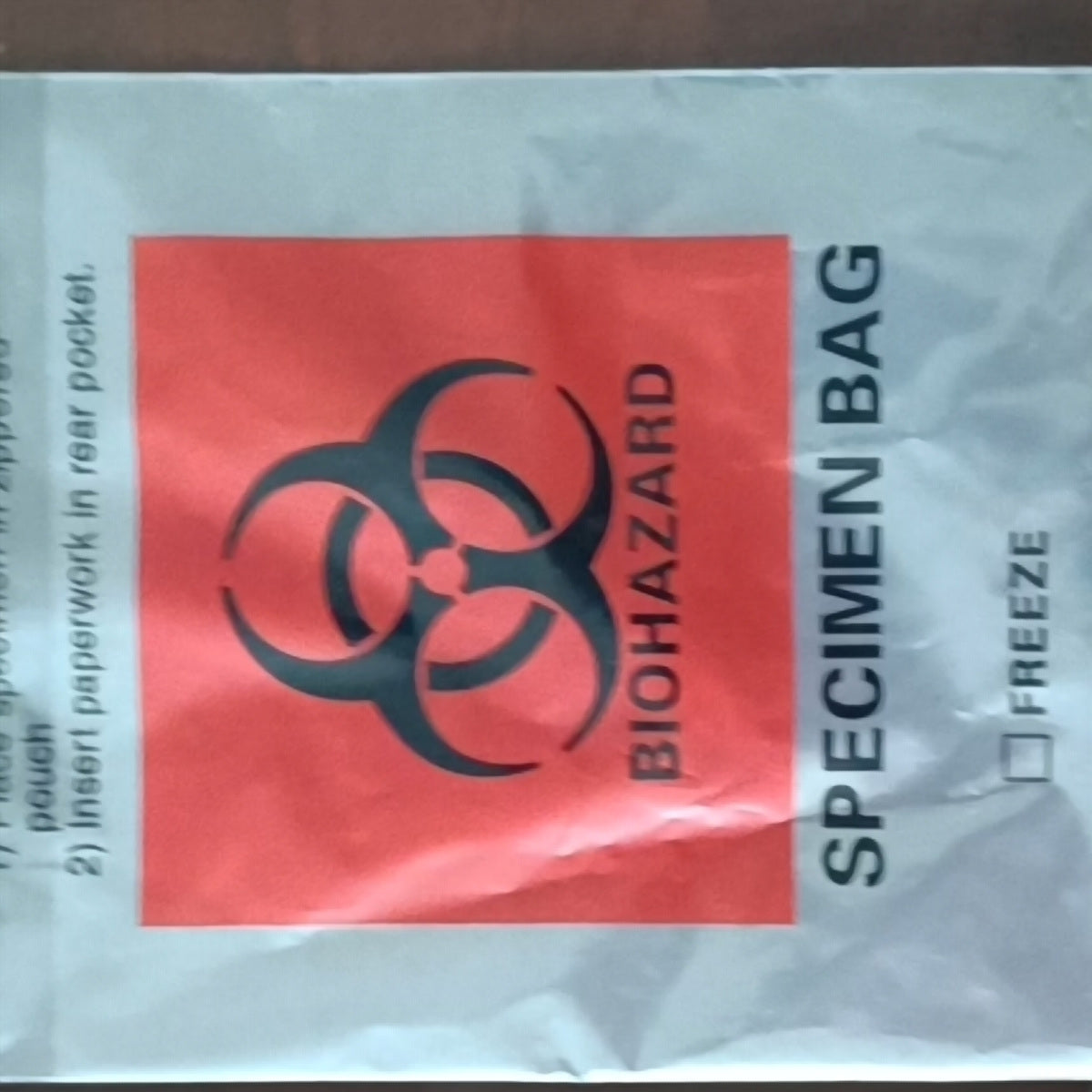 CliniEco Medical UN3373 95 kPa specimen transport bag 6 x 9 in — printed BIOHAZARD / SPECIMEN BAG markings on the bag face